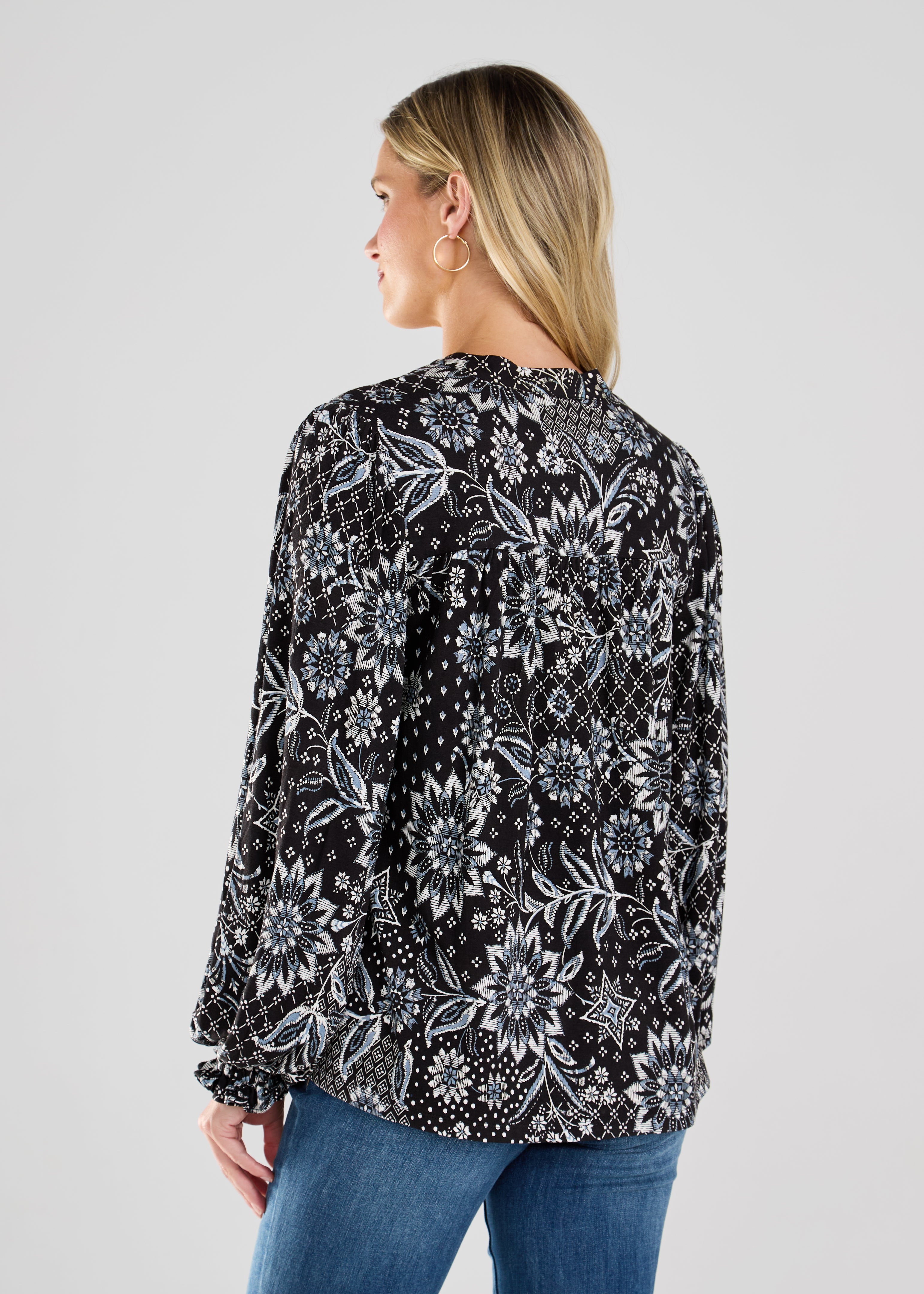 This boho blouse combines feminine flair with a touch of vintage-inspired style for a truly unique piece.