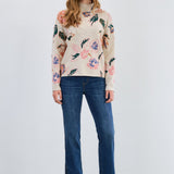 Stay cozy and chic in the FDJ Mock Neck Loose Fit Sweater! Its relaxed silhouette and soft fabric make it perfect for layering or lounging. The playful mock neck adds a fun twist to your everyday look, keeping you warm without sacrificing style. Whether you're out for coffee or curling up with a book, this sweater brings comfort and charm to your wardrobe.