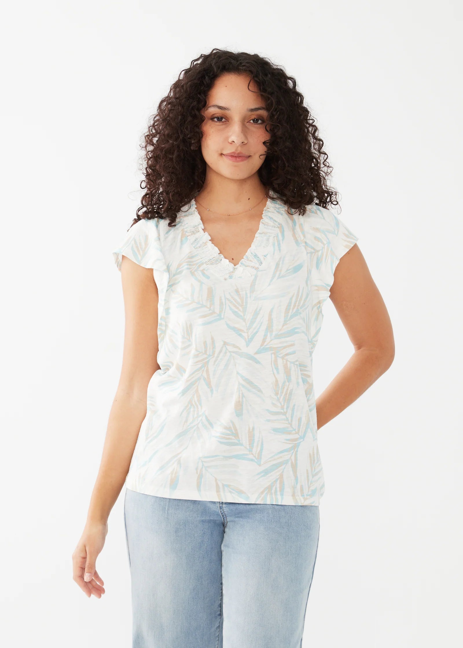 Elevate your summer wardrobe with this effortlessly stylish and comfortable loose-fit jersey top, featuring a local artist print.