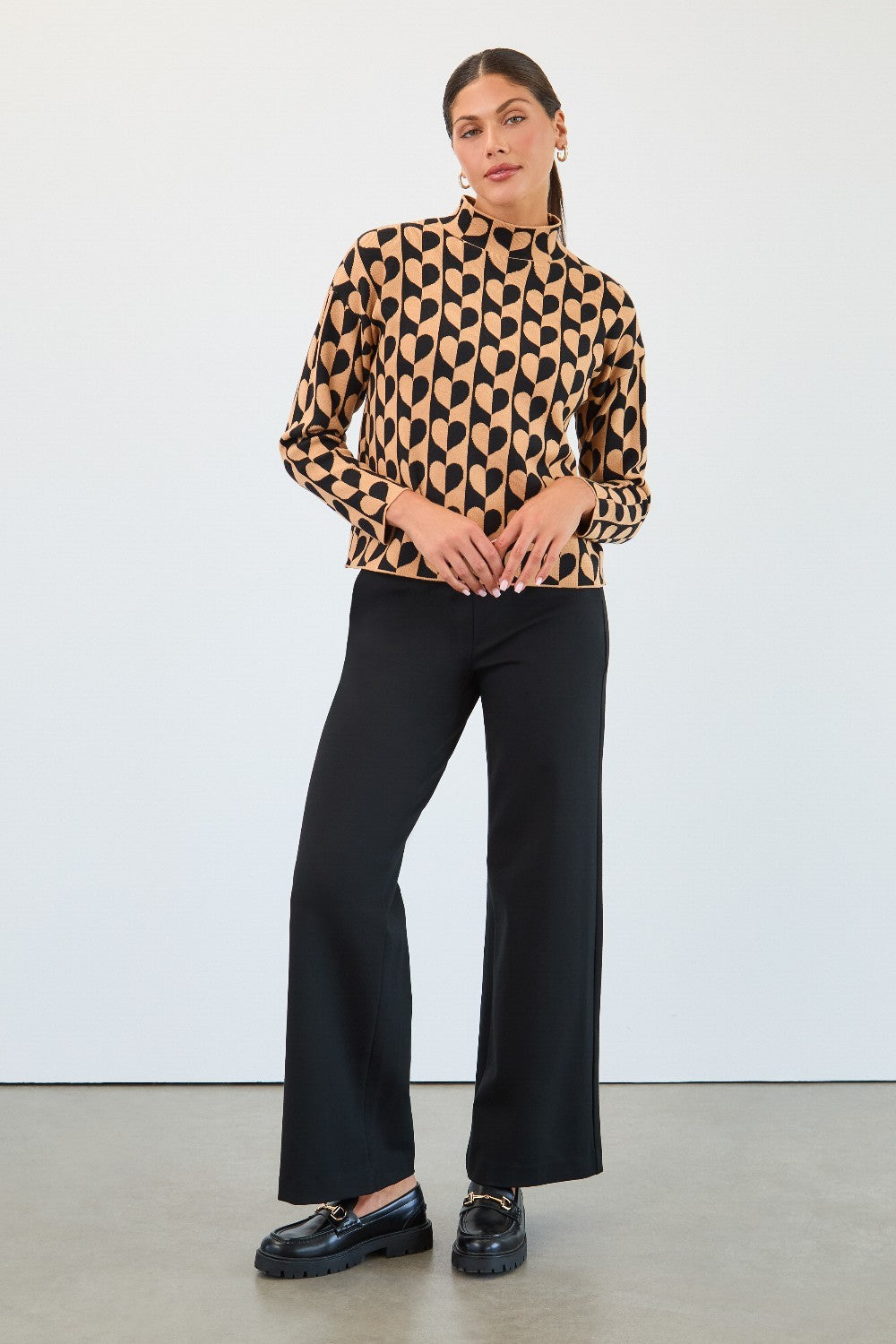 Crafted from premium Ponte de Roma fabric, these pants offer luxurious softness and excellent stretch for effortless all-day comfort.