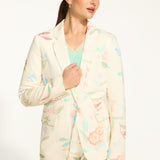 Expertly crafted from a linen blend, this FDJ Textured Printed Blazer boasts a beautiful floral print that is both timeless and elegant. Its impeccable construction and versatile fabric make it a must-have for any wardrobe. Elevate any look with this statement piece.