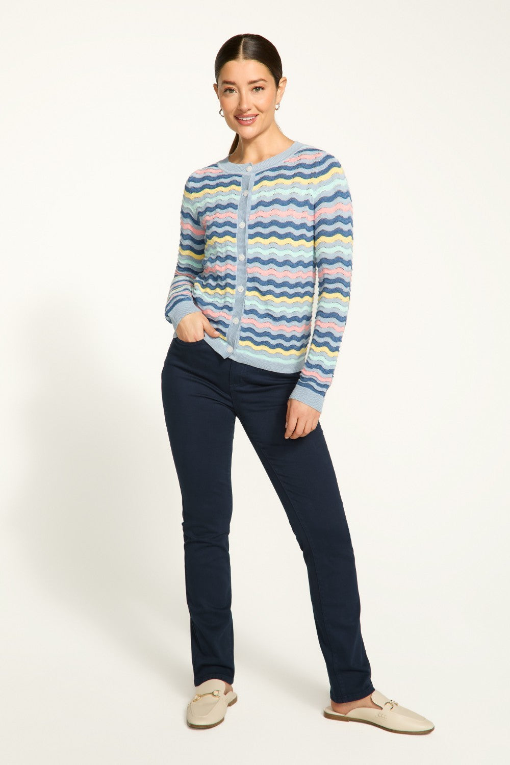 This FDJ Wave Stitch Cardigan features a full button front for easy wear and a lightweight design for added comfort. With a fun wave stitch pattern, this cardigan is ideal for adding a pop of style to any outfit.