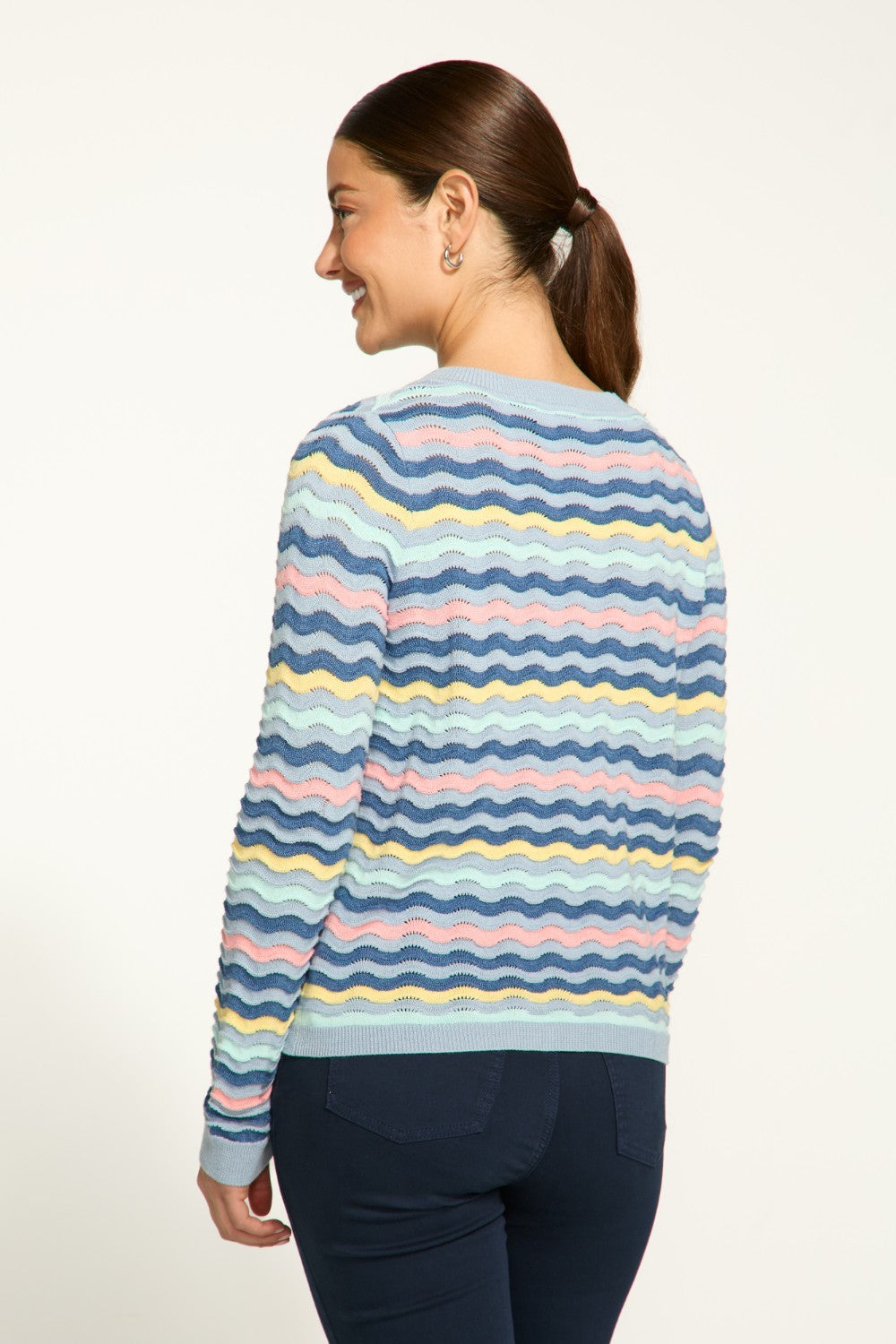 This FDJ Wave Stitch Cardigan features a full button front for easy wear and a lightweight design for added comfort. With a fun wave stitch pattern, this cardigan is ideal for adding a pop of style to any outfit.