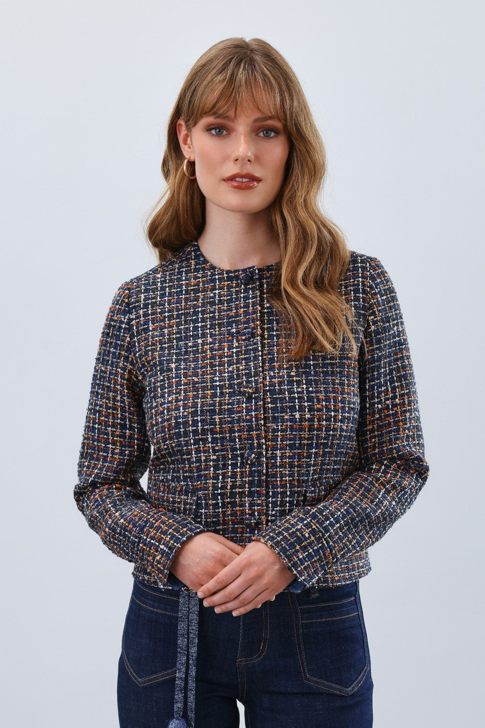 Elevate your wardrobe with the FDJ Tweed Collarless Jacket, a timeless piece that blends classic texture with modern sophistication. Its refined tweed fabric offers warmth and durability, while the collarless design creates a sleek, versatile silhouette perfect for both professional and casual settings. Experience effortless style and comfort that transitions seamlessly from day to night.