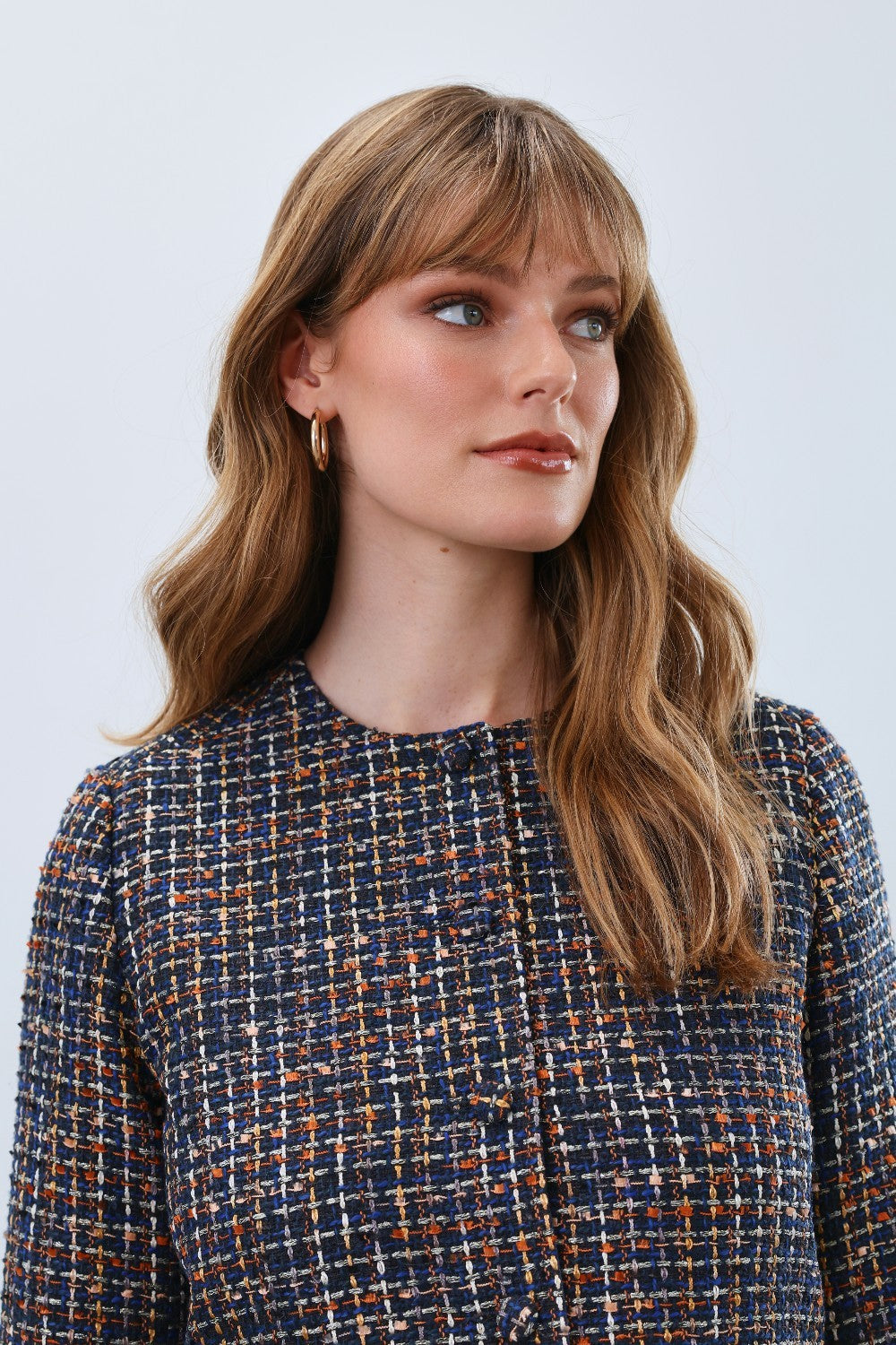 Elevate your wardrobe with the FDJ Tweed Collarless Jacket, a timeless piece that blends classic texture with modern sophistication. Its refined tweed fabric offers warmth and durability, while the collarless design creates a sleek, versatile silhouette perfect for both professional and casual settings. Experience effortless style and comfort that transitions seamlessly from day to night.