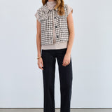 The FDJ Tweed Vest combines timeless style with modern design, featuring a full button front for easy wear and a polished look. Its classic tweed fabric offers a refined texture, making it a versatile addition to your wardrobe. Perfect for layering, this vest supports your style with comfort and sophistication.