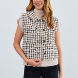 The FDJ Tweed Vest combines timeless style with modern design, featuring a full button front for easy wear and a polished look. Its classic tweed fabric offers a refined texture, making it a versatile addition to your wardrobe. Perfect for layering, this vest supports your style with comfort and sophistication.
