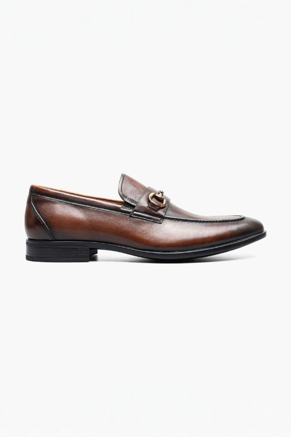 Black patent leather shoe with buckles on a white background