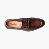 Brown leather loafer shoe on a white background