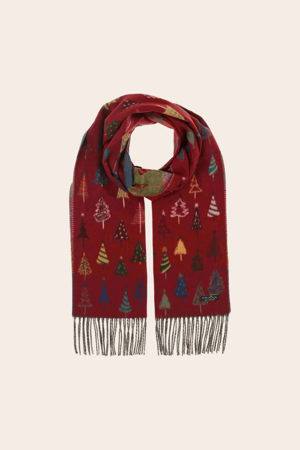 Red scarf with Christmas tree patterns on a beige background