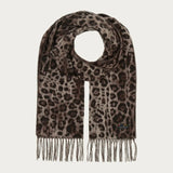 Leopard print scarf with fringes on a light gray background