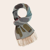Patterned scarf with fringes on a beige background