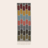 Rectangular scarf with colorful abstract pattern on a beige background