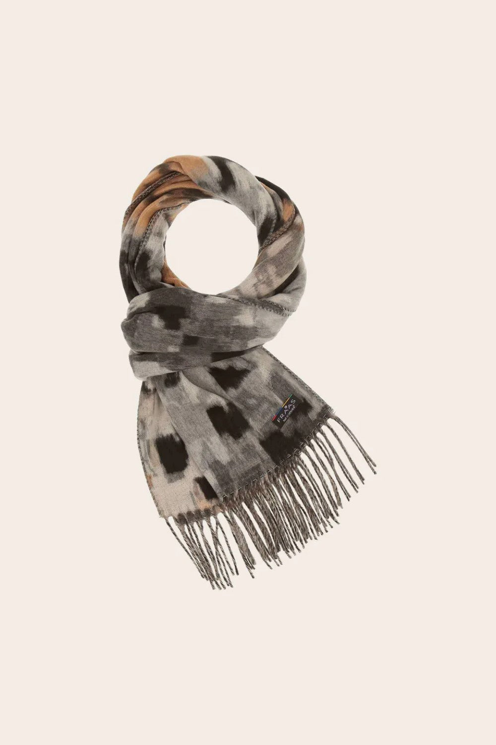 Patterned scarf with fringe on a beige background