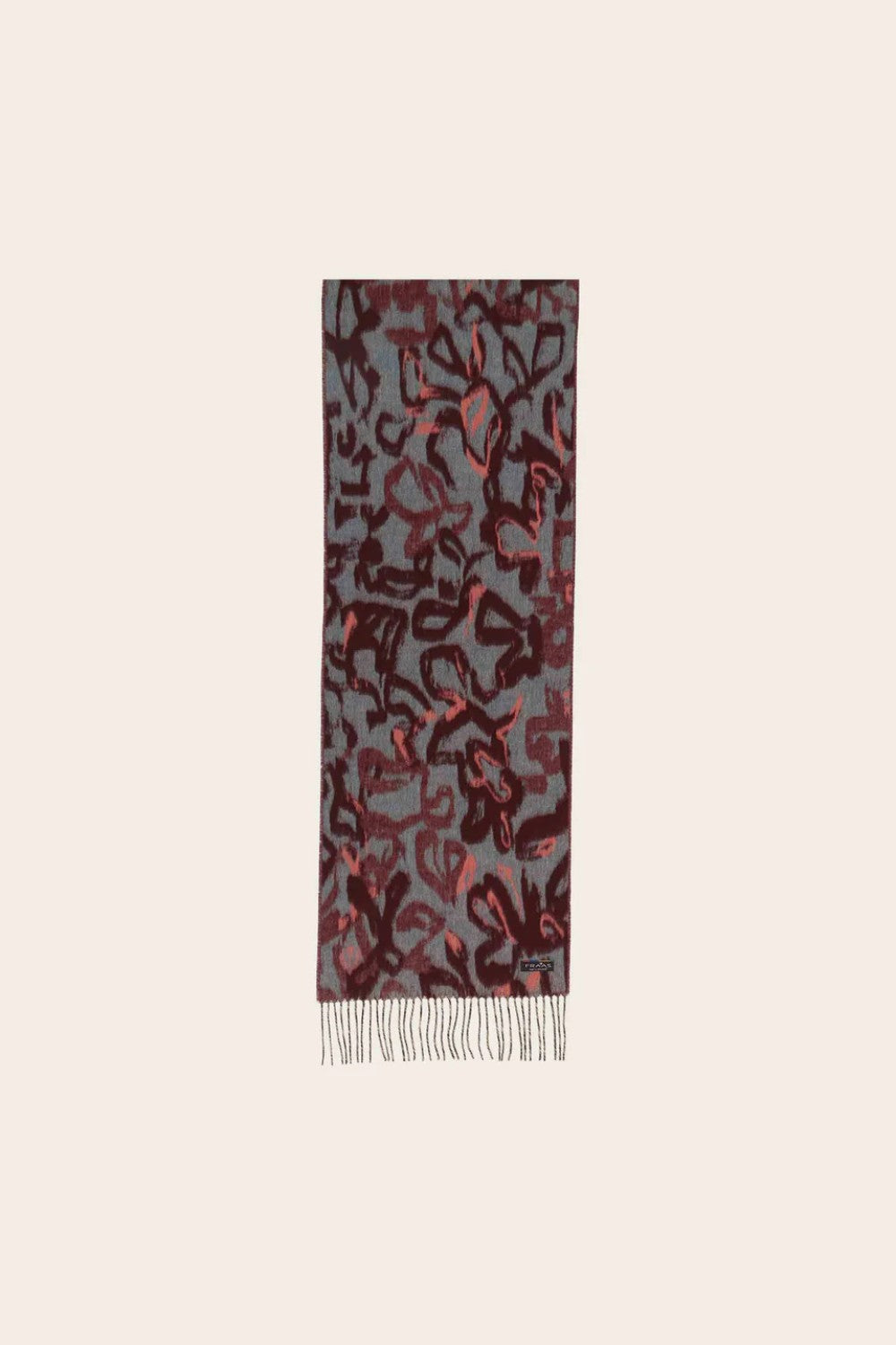 Patterned scarf on a light beige background