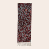 Patterned scarf on a light beige background