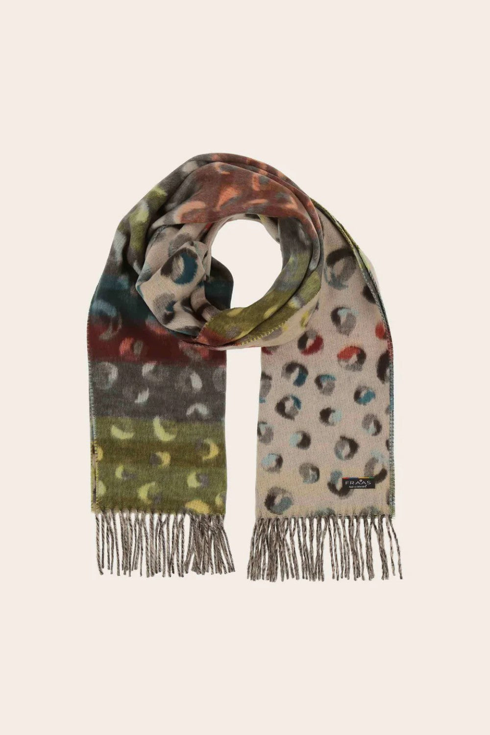 Multicolored patterned scarf with fringes on a beige background