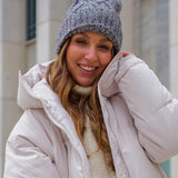 This makes winter fun: the mottled knitted hat with cable pattern and bobble looks great and keeps your head and ears nice and warm even in cold temperatures. Thanks to the wide cuff and a size of 22 x 25 cm, the hat fits perfectly on the head and can be combined with a sporty casual outfit or an elegant coat. The hat is an eye-catching addition to any outfit. It makes fall or winter walks fun!