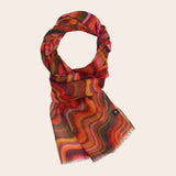 Colorful patterned scarf on a beige background