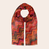 Colorful patterned scarf on a beige background