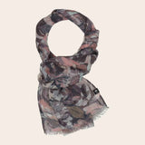 Floral patterned scarf on a beige background