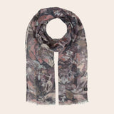 Floral patterned scarf on a beige background