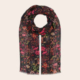 Floral patterned scarf on a beige background