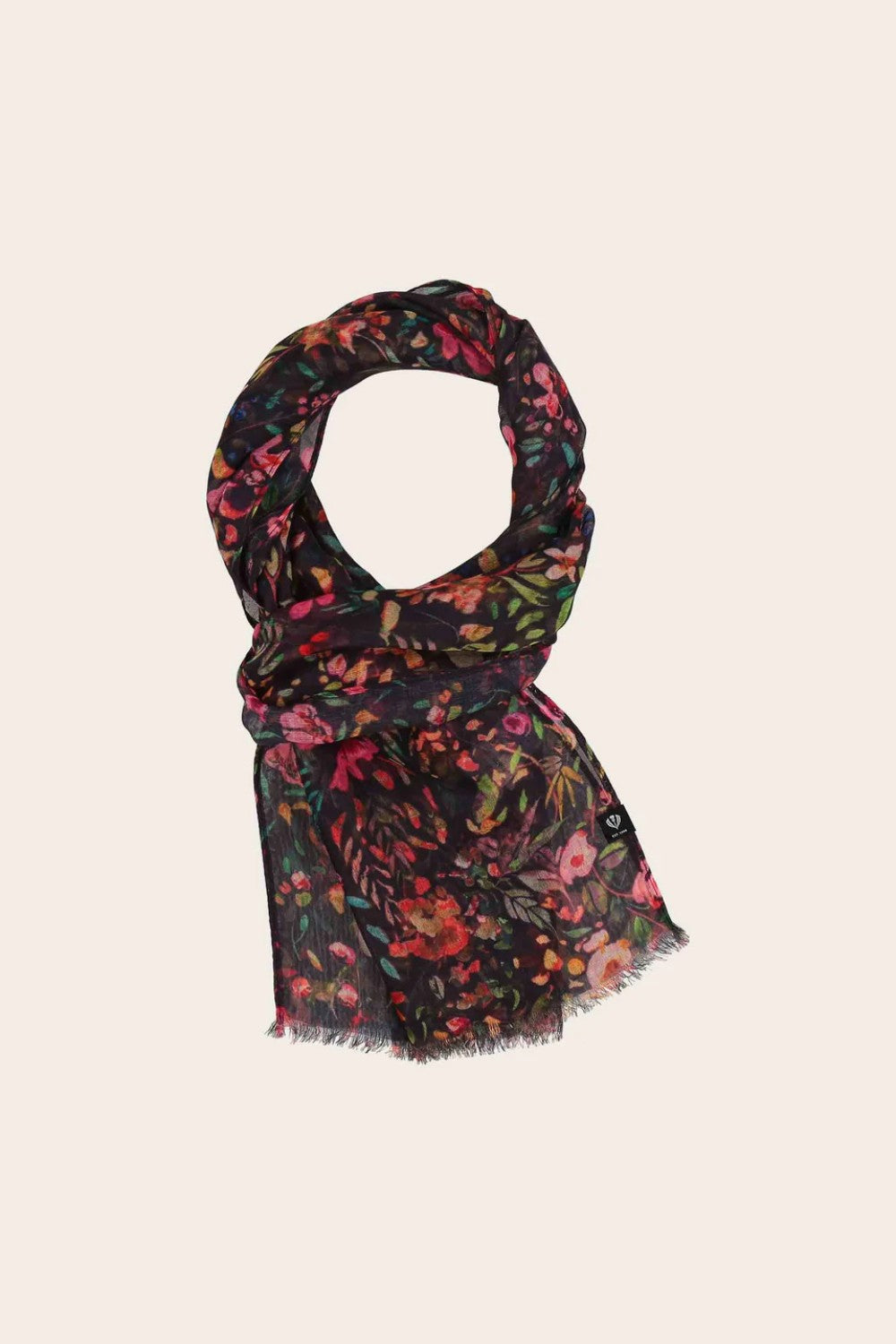 Floral patterned scarf on a beige background