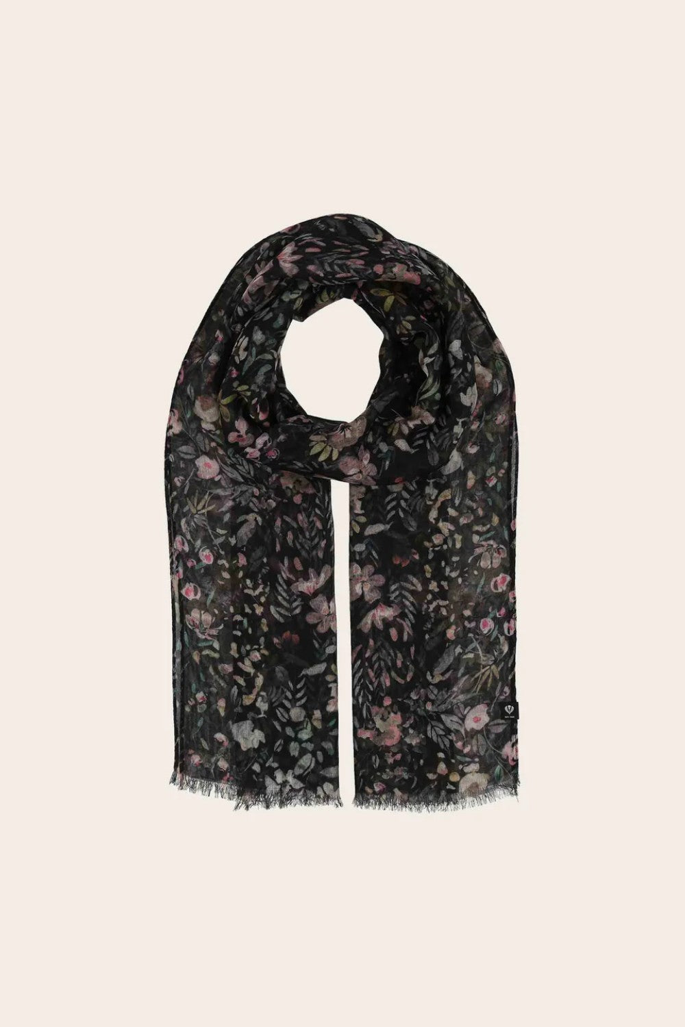 Black scarf with floral pattern on light background