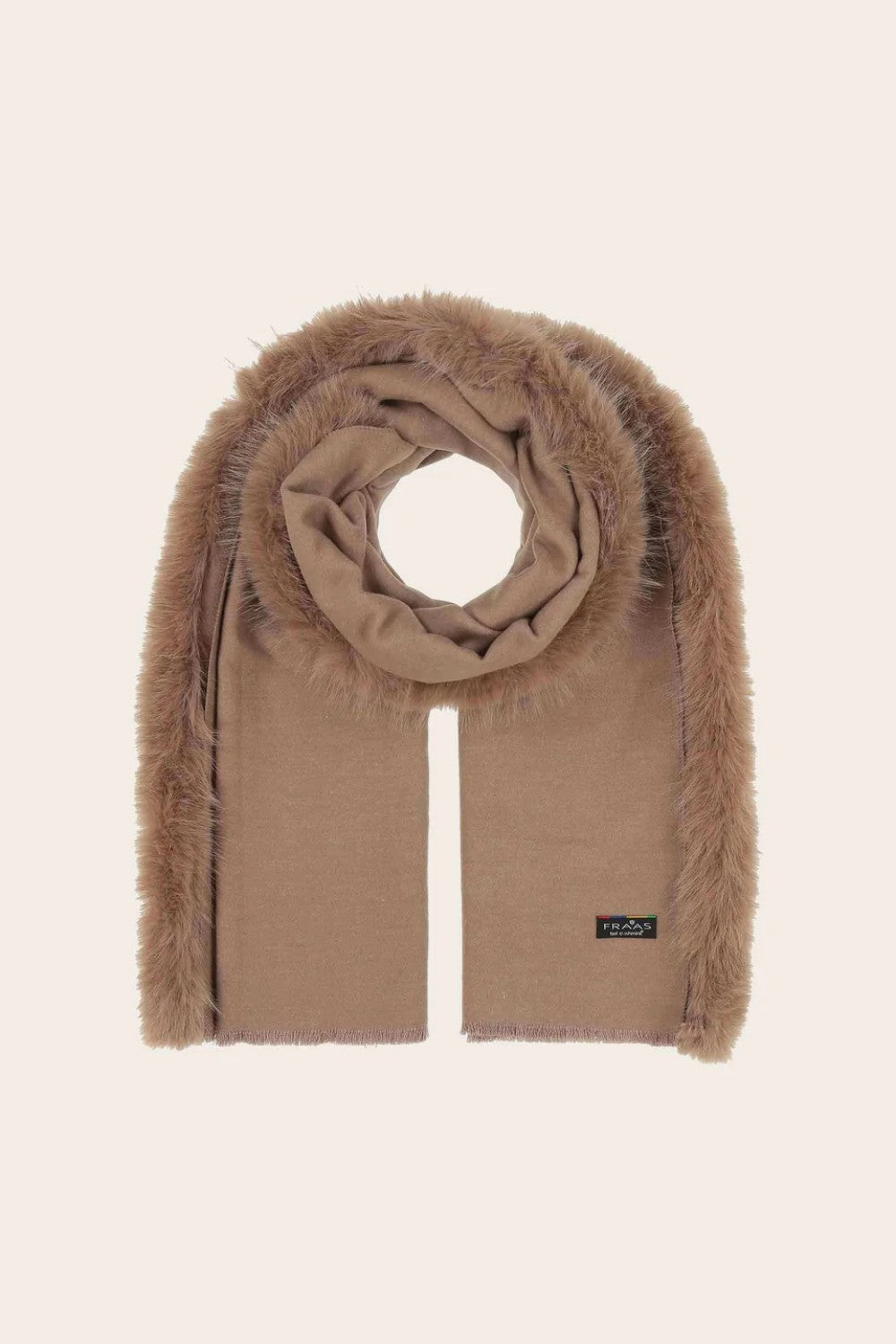 Beige scarf with fluffy edges on a beige background