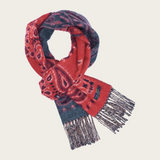 A red and grey paisley scarf, with fringe, photographed against a light background.