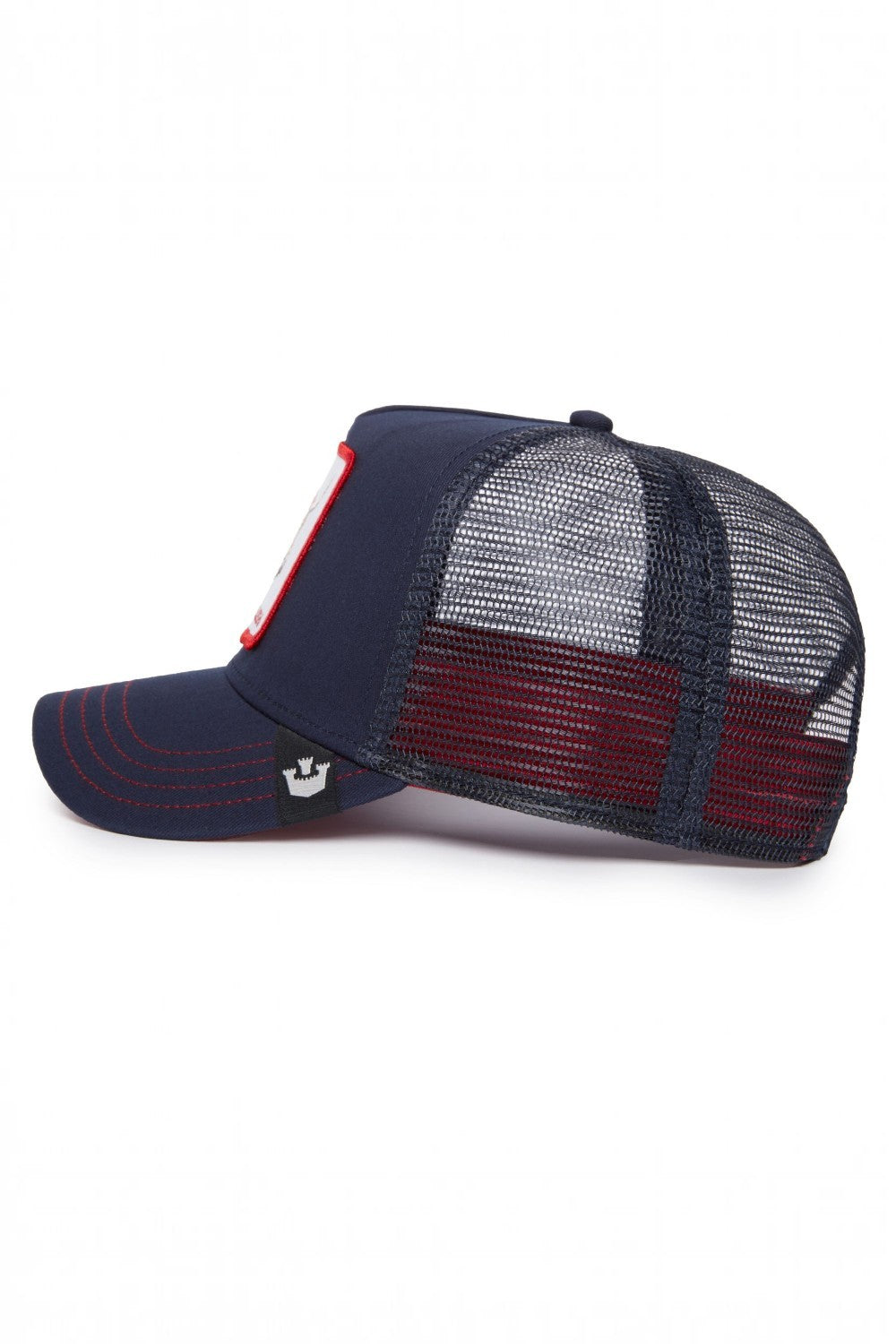 A navy blue trucker-style cap with a navy and burgundy mesh back, featuring a small white crown logo on the brim and a red and white patch on the side.