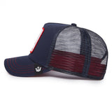 A navy blue trucker-style cap with a navy and burgundy mesh back, featuring a small white crown logo on the brim and a red and white patch on the side.