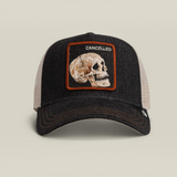 Black denim keeps it grounded while the skull patch stamped CANCELED says what everyone’s thinking. This one’s already dead, so it can’t be killed twice. Dark wash, bone-white skull energy, and zero concern for public approval.