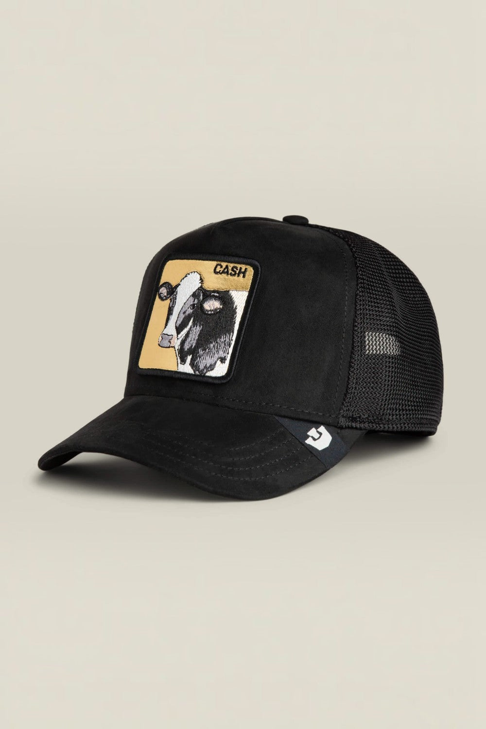 All black suede with a gold-backed cow patch that spells CASH, because subtlety doesn’t pay the bills. The black colorway keeps it serious while the cow patch quietly flexes dairy-farm-meets-bull-market energy. Calm face, heavy value, and zero interest in spare change.