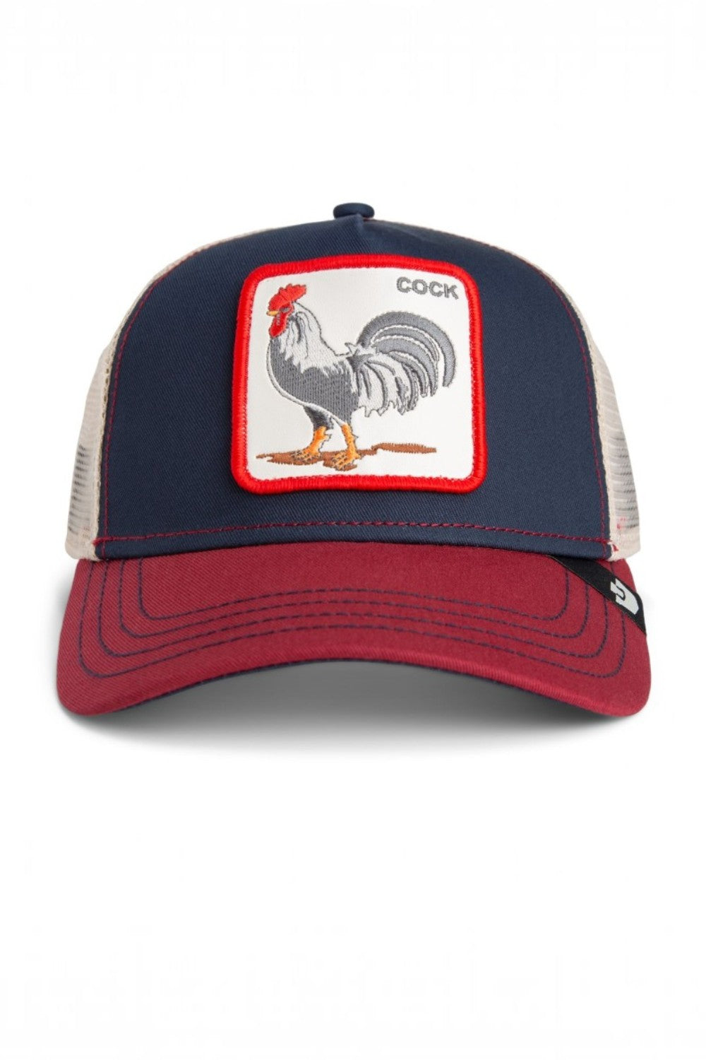 A navy blue and maroon trucker hat with a front patch featuring a rooster illustration and the word 'COCK'.
