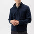 Wind-lined milano knitted jacket / overshirt in 100% cotton. Hidden zipper with button placket and chest pocket. Practical pockets on the sides with zipper. Regular fit. The sweater has a windproof lining that consists of 96% polyester and 4% elastane. No chemicals are used to achieve the windproof function. Instead, the lining is manufactured with a special weaving technique that makes the fabric extremely tightly woven and therefore also windproof, while the fabric breathes.