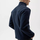 Wind-lined milano knitted jacket / overshirt in 100% cotton. Hidden zipper with button placket and chest pocket. Practical pockets on the sides with zipper. Regular fit. The sweater has a windproof lining that consists of 96% polyester and 4% elastane. No chemicals are used to achieve the windproof function. Instead, the lining is manufactured with a special weaving technique that makes the fabric extremely tightly woven and therefore also windproof, while the fabric breathes.