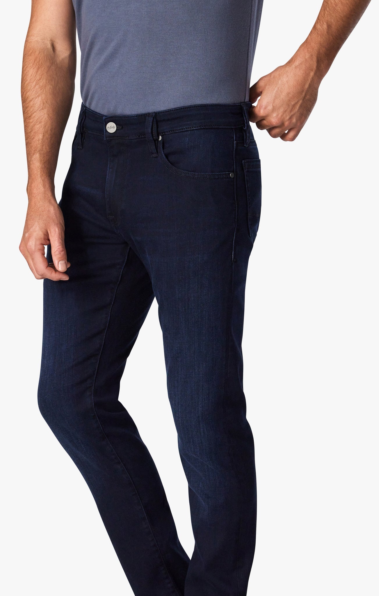 A classic, straight-leg jean in a high-rise fit. Stretchy, premium fabric with a dark, clean wash. Luxury, comfort, sophistication and style that can transition from day to night when paired with a classic sports coat.