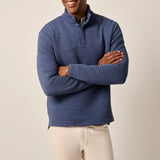 This tech-forward, snap quarter-zip is made with a textured blend of recycled material that looks cool, feels cool and performs like a champ