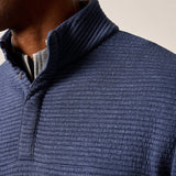 This tech-forward, snap quarter-zip is made with a textured blend of recycled material that looks cool, feels cool and performs like a champ