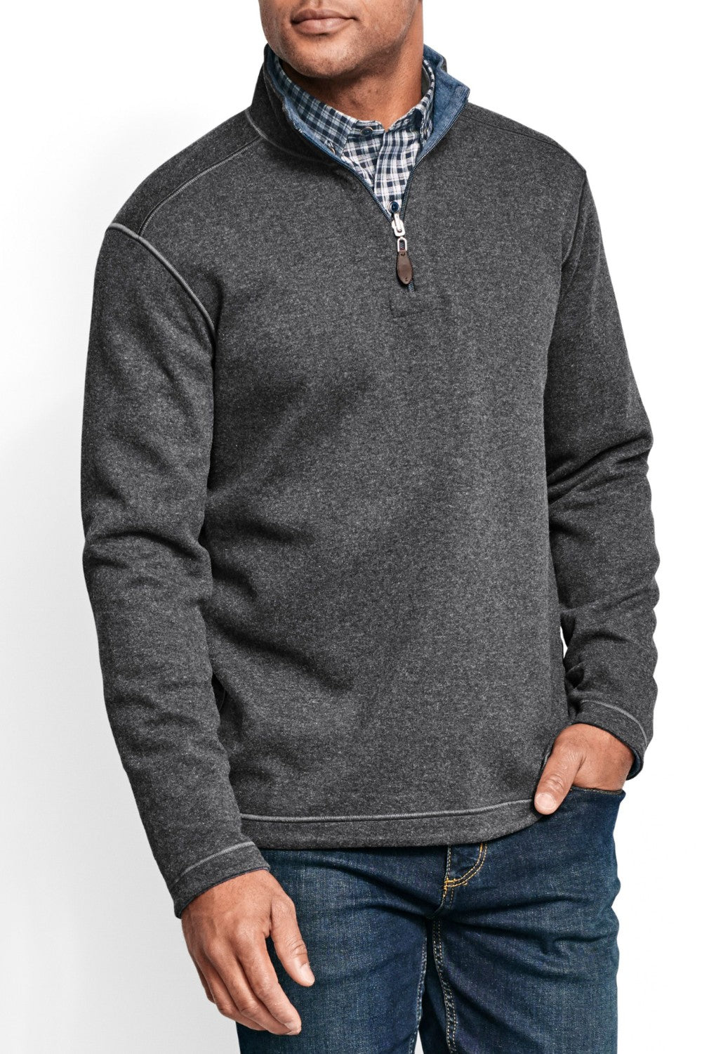 Get cozy and versatile with the Johnston &amp; Murphy 1/4 zip Reversible Fleece. Keep warm and stylish with the soft cotton-blend knit that reverses from a solid to a coordinating heather shade, and stay practical with the quarter zip placket and leather-look pull. Perfect for any occasion with tonal cover-stitch details.