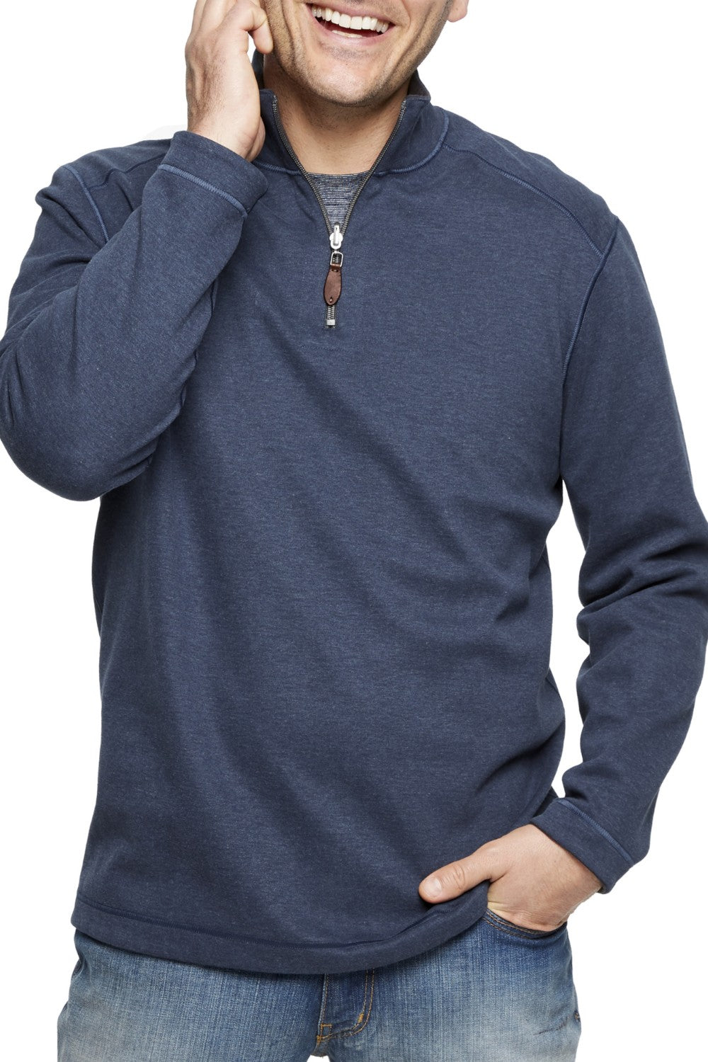 Get cozy and versatile with the Johnston &amp; Murphy 1/4 zip Reversible Fleece. Keep warm and stylish with the soft cotton-blend knit that reverses from a solid to a coordinating heather shade, and stay practical with the quarter zip placket and leather-look pull. Perfect for any occasion with tonal cover-stitch details.