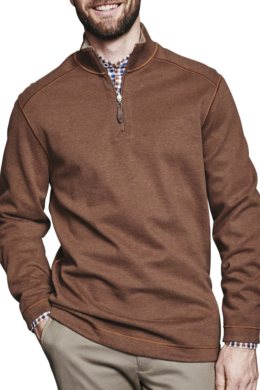 Get cozy and versatile with the Johnston &amp; Murphy 1/4 zip Reversible Fleece. Keep warm and stylish with the soft cotton-blend knit that reverses from a solid to a coordinating heather shade, and stay practical with the quarter zip placket and leather-look pull. Perfect for any occasion with tonal cover-stitch details.