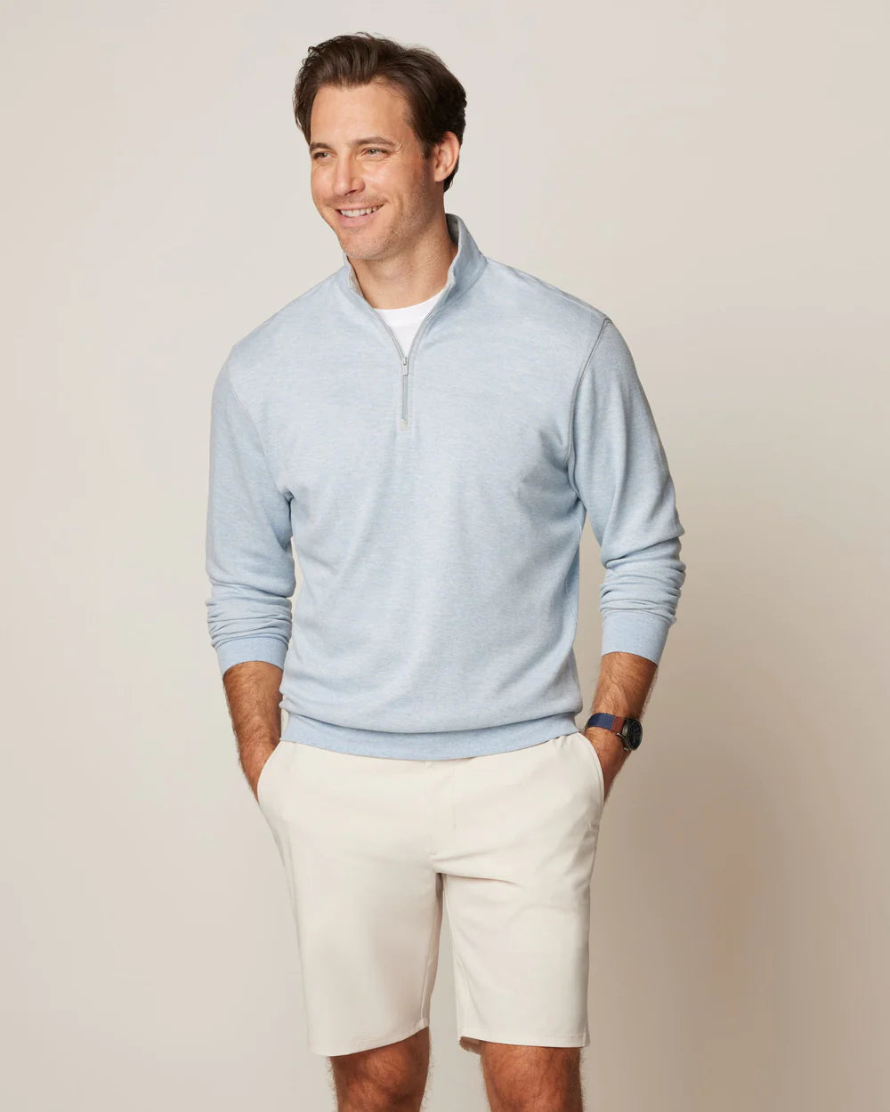 This pullover is constructed with a lightweight, soft, and durable cotton blend fabric, resulting in a crisp and clean appearance that is both stylish and comfortable.