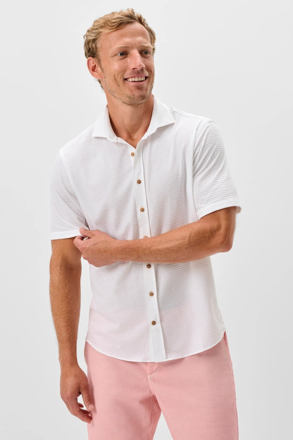 This knit button-down from our Hangin' Out Collection‚ which is designed to look its best untucked, is made with a modern seersucker fabric that breathes and moves better than the traditional. This is how you do elevated casual while staying completely comfortable.