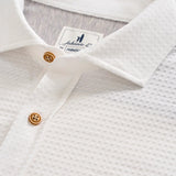 This knit button-down from our Hangin' Out Collection‚ which is designed to look its best untucked, is made with a modern seersucker fabric that breathes and moves better than the traditional. This is how you do elevated casual while staying completely comfortable.