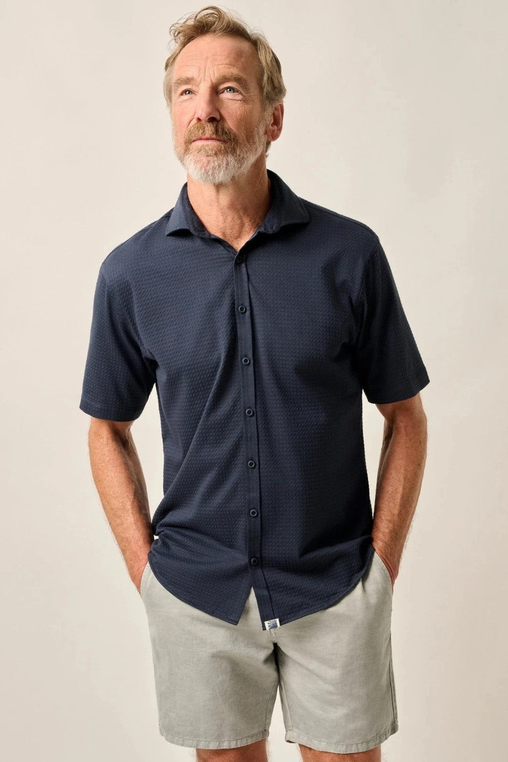 This knit button-down from our Hangin' Out Collection‚ which is designed to look its best untucked, is made with a modern seersucker fabric that breathes and moves better than the traditional. This is how you do elevated casual while staying completely comfortable.