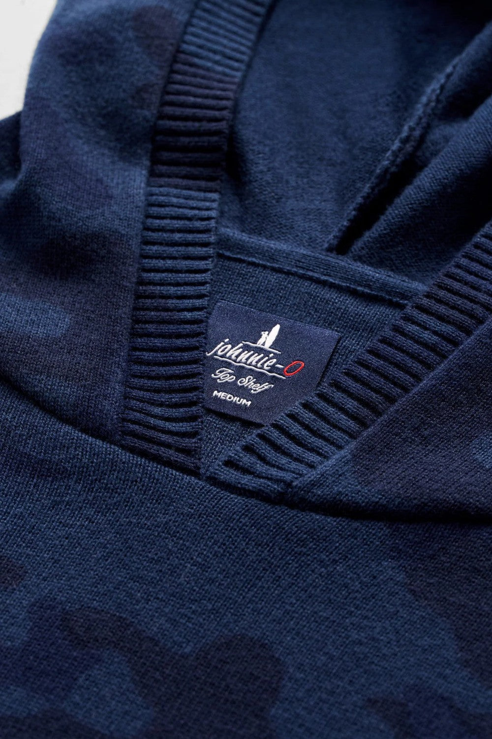 Knit with a breathable blend of cotton, nylon and silk, this camo hoodie balances functionality, comfort and style points perfectly for your cool weather rotation. And not for nothing, can work on the golf course