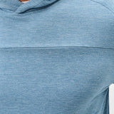 Close-up of a person wearing a blue hoodie on a white background